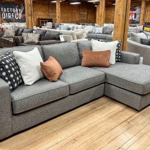 grey sectional in the stock room at benson stone co