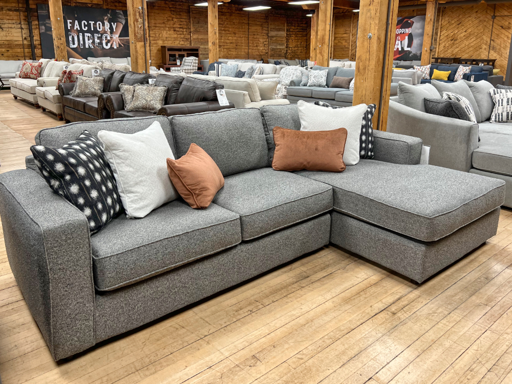 grey sectional in the stock room at benson stone co
