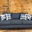 navy three seat sofa in the stock room furniture warehouse