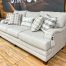 cream color english rolled arm sofa in the stock room discount furniture warehouse in rockford, il