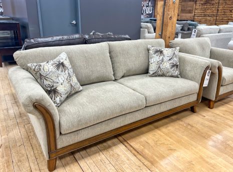 traditional sofa with splayed arms and hardwood trim at the stock room in rockford, il