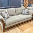 traditional sofa with splayed arms and hardwood trim at the stock room in rockford, il