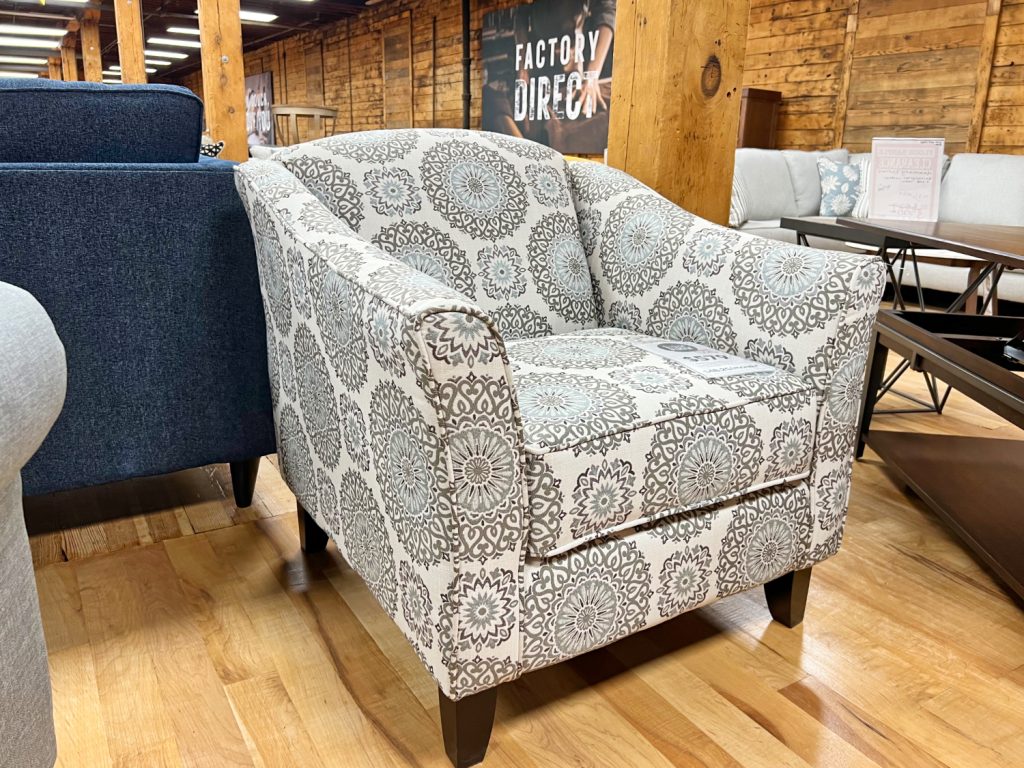 medallion patterned armchair in the stock room discount furniture warehouse