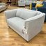 MCM armchair in grey upholstery at the stock room discount furniture factory in rockford, il