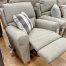 beige reclining chair in the stock room discount furniture warehouse in rockford, IL