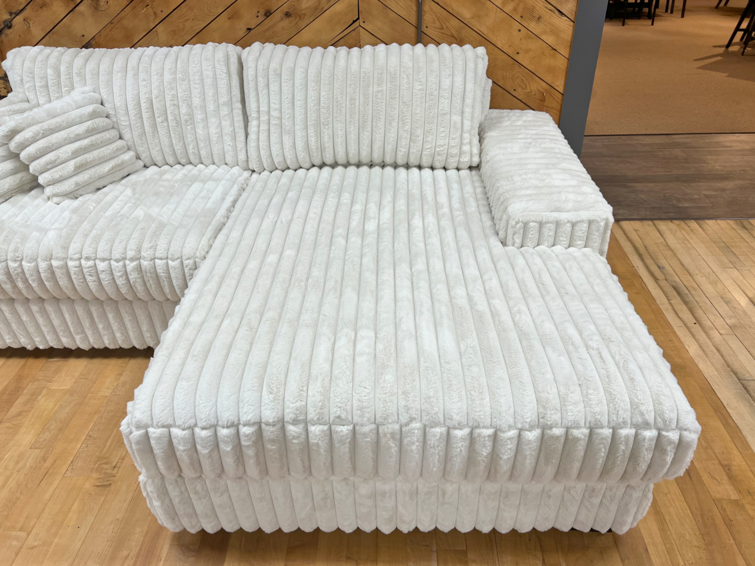 jumbo fluffy corduroy chaise sofa sectional extra wide reversible at the stock room discount furniture warehouse in rockford, il