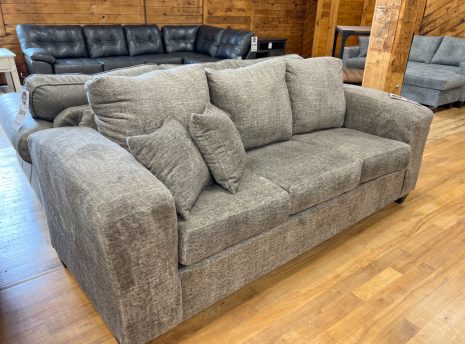 three seat sofa with extra wide track arms in cozy taupe fabric in the stock room furniture warehouse in rockford, il