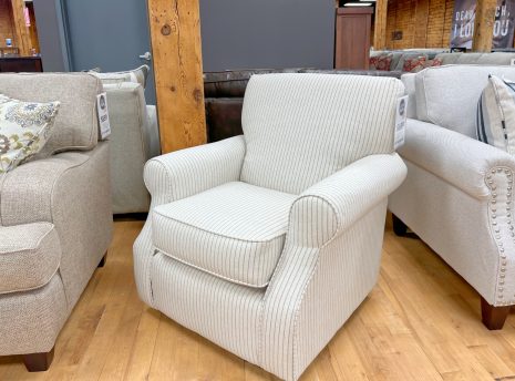 pinstripe swivel chair in cream color at the stock room discount furniture warehouse in rockford, il