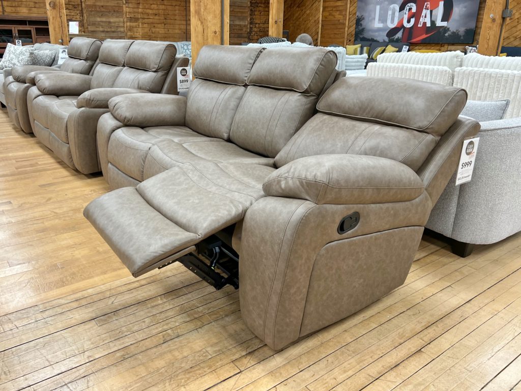 three seat manual reclining sofa in taupe leather-look upholstery built in california