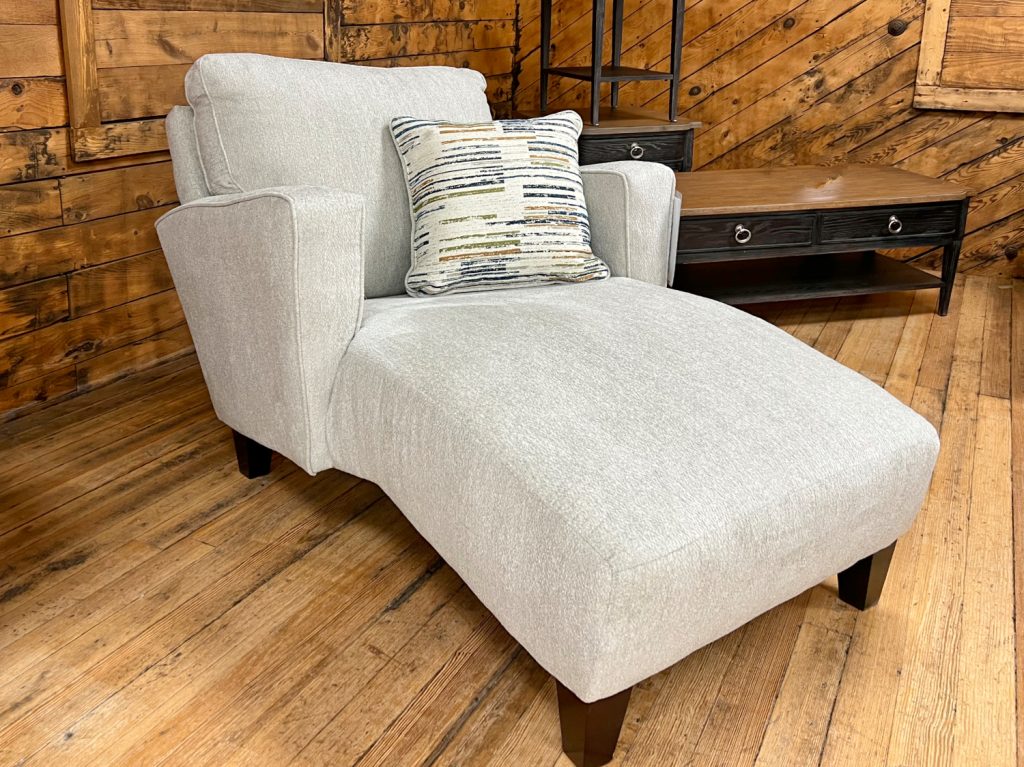 chaise lounge chair in light grey mist color in the stock room discount furniture warehouse in Rockford, IL