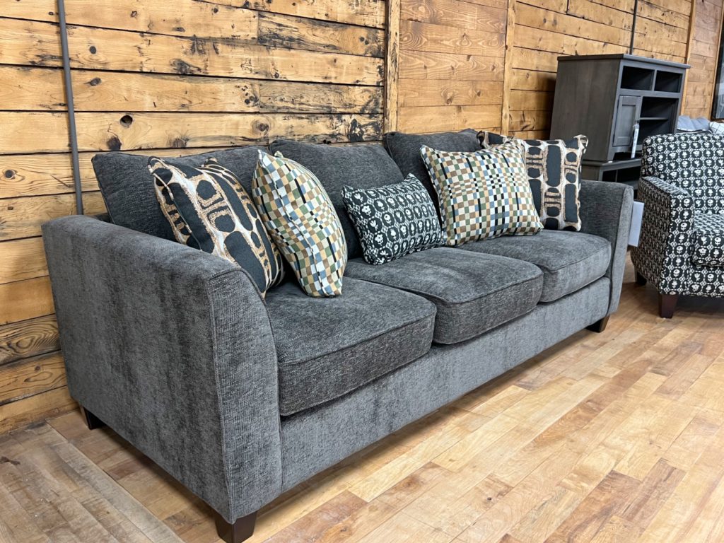 charcoal three seat sofa in the stock room discount furniture warehouse in rockford, il