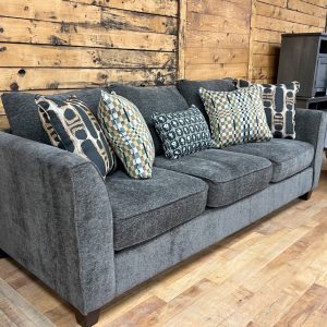 charcoal three seat sofa in the stock room discount furniture warehouse in rockford, il