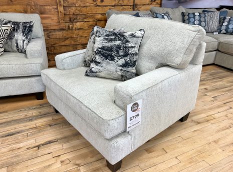 cozy contemporary chair and a half in a soft oatmeal off-white upholstery at the stock room discount furniture warehouse in rockford, il