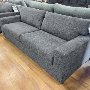 two seat wide track arm sofa in cozy charcoal fabric in the stock room discount furniture warehouse in rockford, il