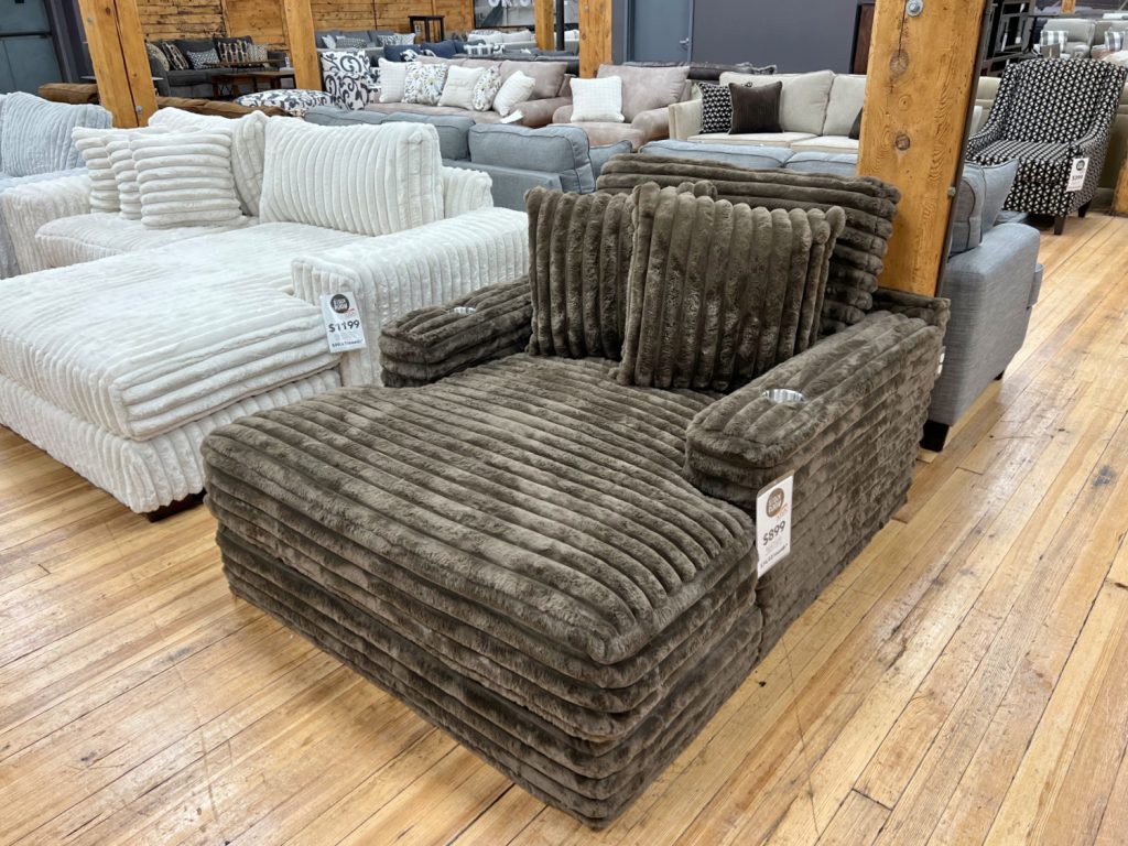 jumbo fluffy corduroy chaise in teddy bear brown in the stock room discount furniture warehouse in rockford, il