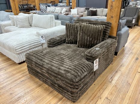 jumbo fluffy corduroy chaise in teddy bear brown in the stock room discount furniture warehouse in rockford, il