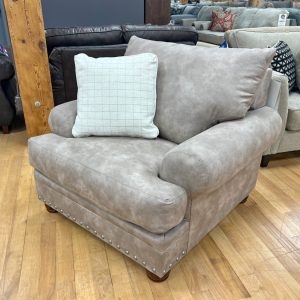 beige cottage sofa with nailhead trim in the stock room discount furniture store in rockford, il