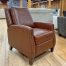 leather-look nailhead recliner in the stock room in rockford, il