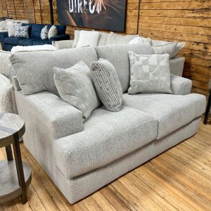 silver gray loveseat in the stock room discount furniture warehouse in rockford, il