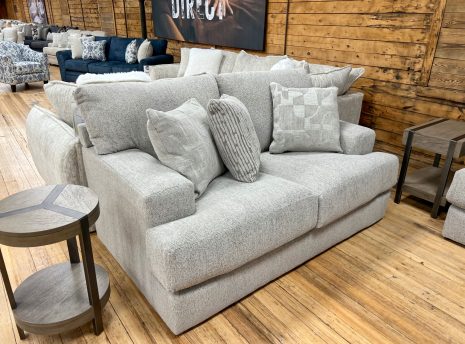 silver gray loveseat in the stock room discount furniture warehouse in rockford, il