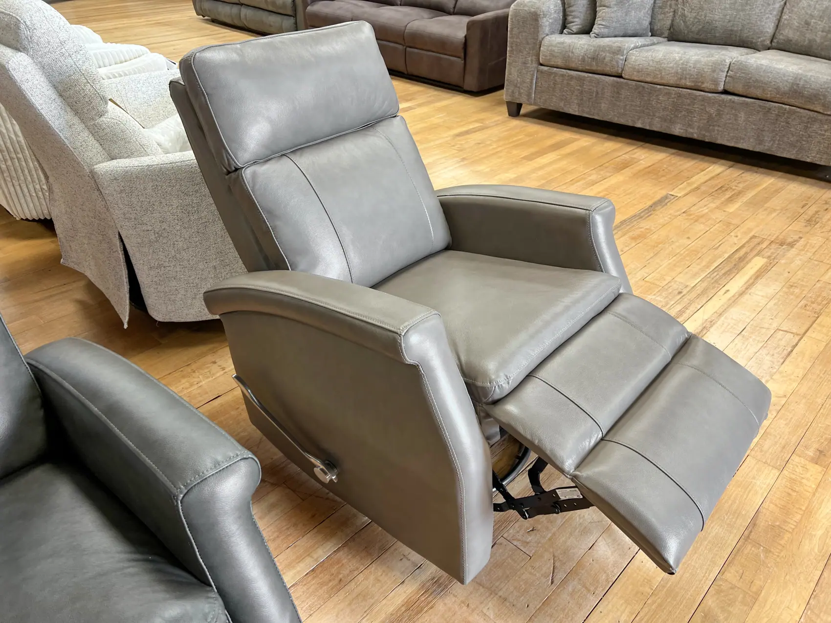 graphite gray swivel glider manual recliner leather-look at the stock room in rockford, il