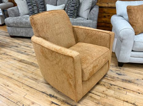 terra cotta orange chenille swivel chair accent chair at the stock room discount furniture warehouse in rockford, il