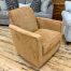 terra cotta orange chenille swivel chair accent chair at the stock room discount furniture warehouse in rockford, il