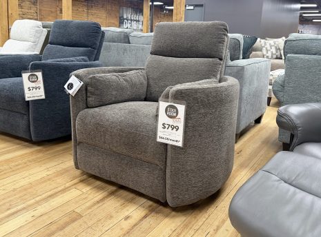 Tezza-7022 A contemporary dark taupe upholstered reclining armchair with a high backrest.